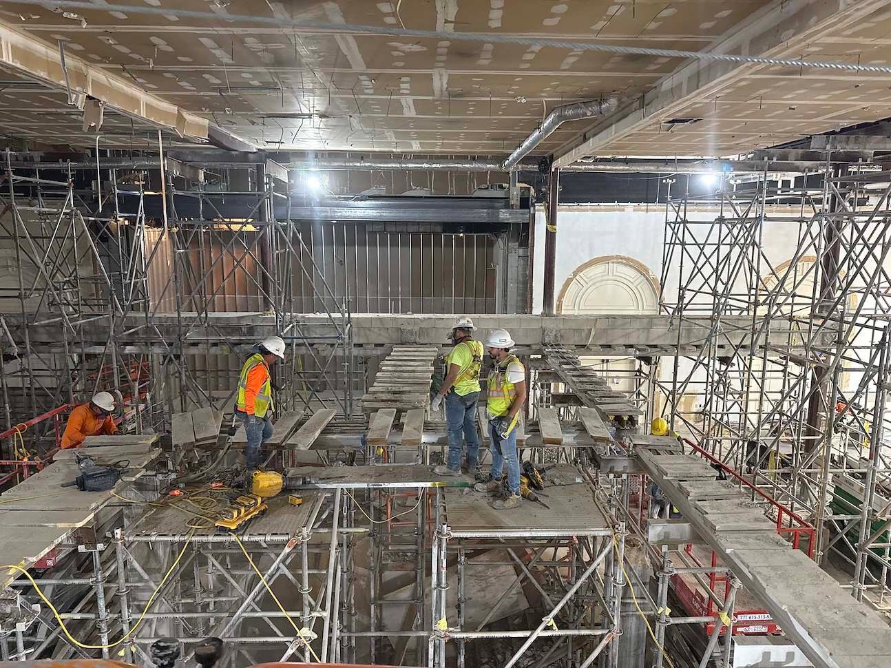 Large-scale interior structural demolition with scaffolding
